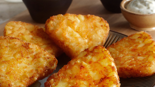 Triangulitos crujientes de patata rallada